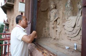 Cina: restauratore di reperti culturali dedica 40 anni alle grotte del Monte Maiji
