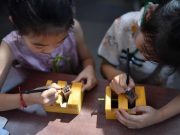 Cina: bambini provano diverse attività durante vacanze estive