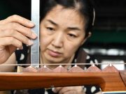 Cina: Hebei, produzione strumenti musicali a Suning