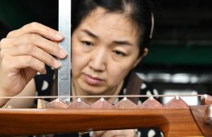 Cina: Hebei, produzione strumenti musicali a Suning