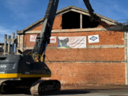 Caffaro, iniziata la bonifica con la demolizione dei capannoni