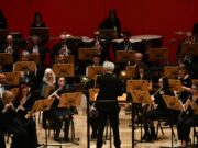 La Banda cittadina in concerto sotto il porticato di Palazzo Loggia